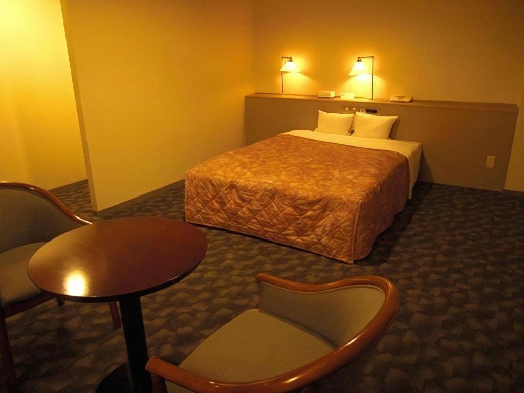 Main Hotel Miyakonojo Bagian luar foto